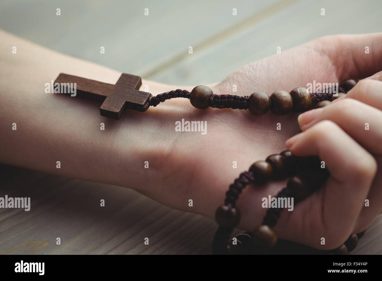 Woman hand rosary hi-res stock photography and images - Alamy
