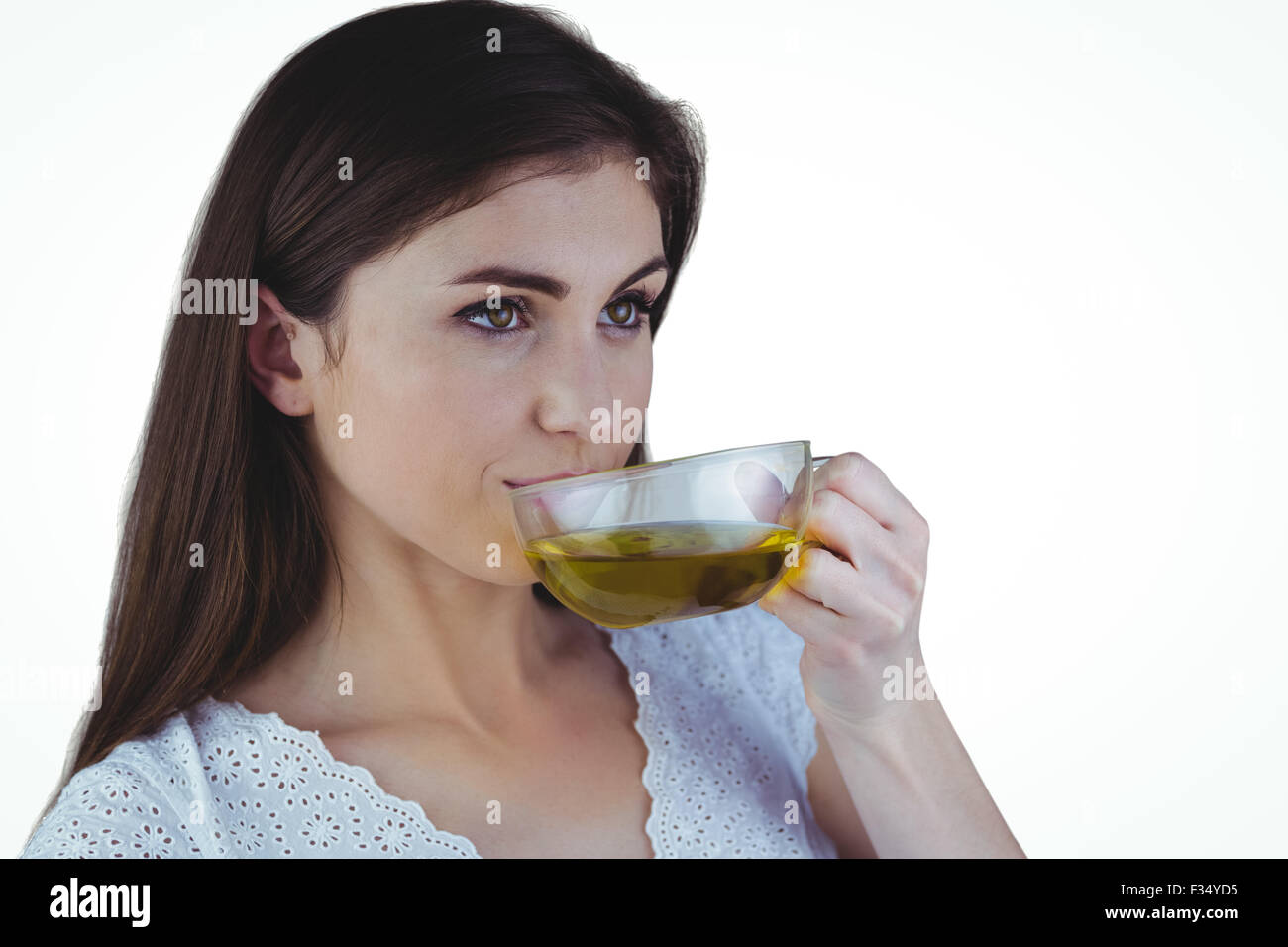 Pretty woman sipping herbal tea Stock Photo