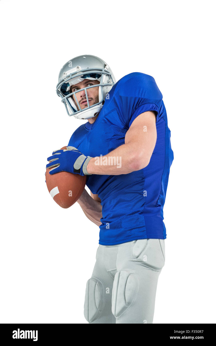 American football player throwing ball Stock Photo Alamy