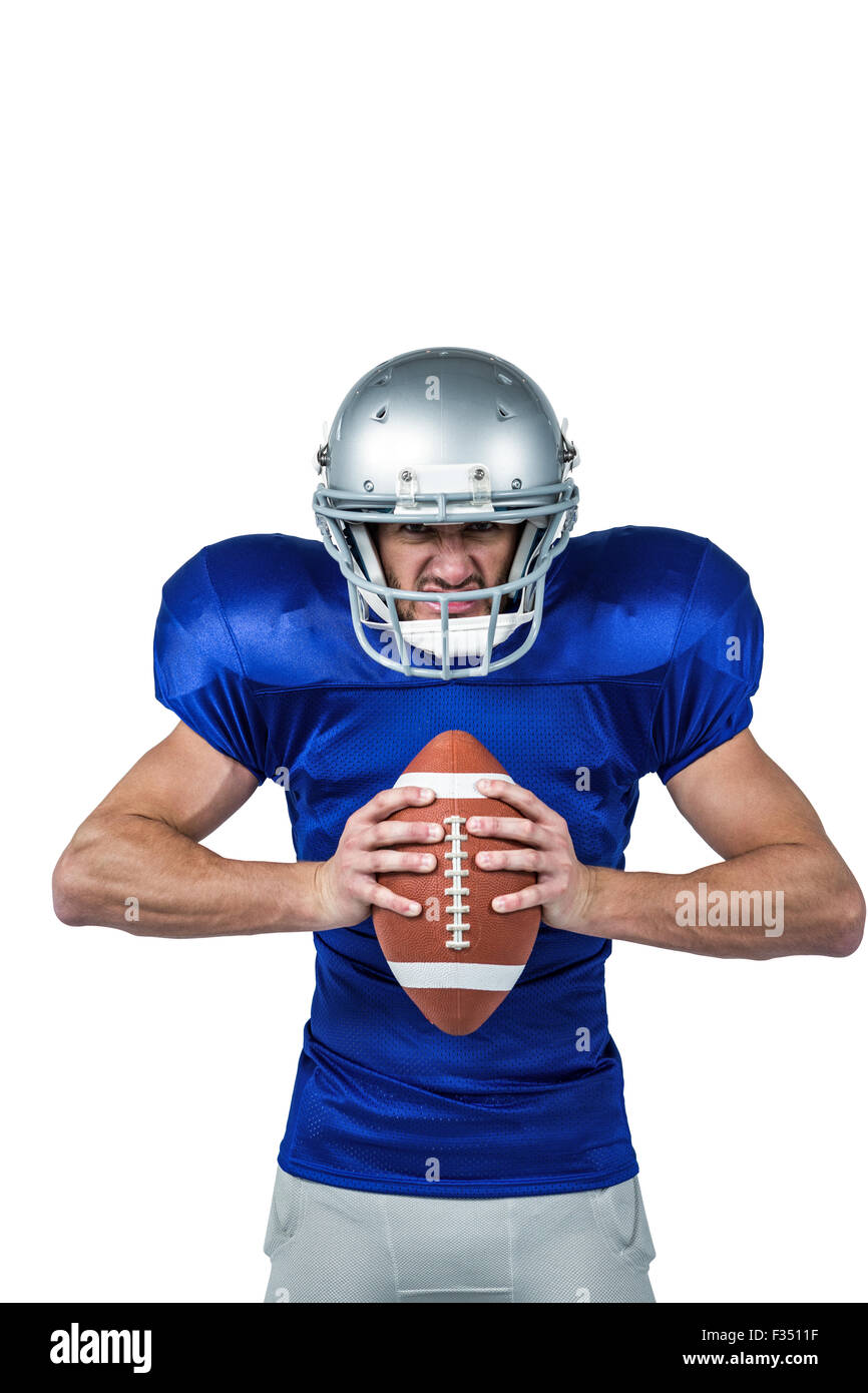 Football player purple uniform running Cut Out Stock Images & Pictures -  Alamy