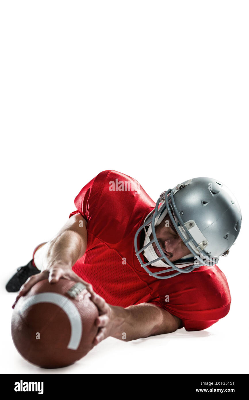 Sportsman struggling to catch the ball Stock Photo