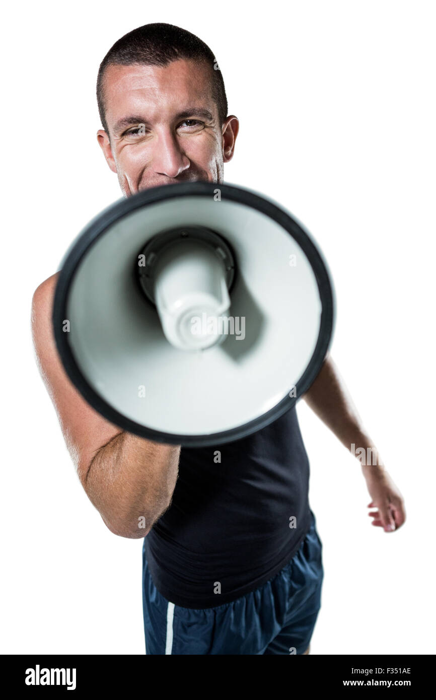 Male trainer yelling through megaphone Stock Photo Alamy