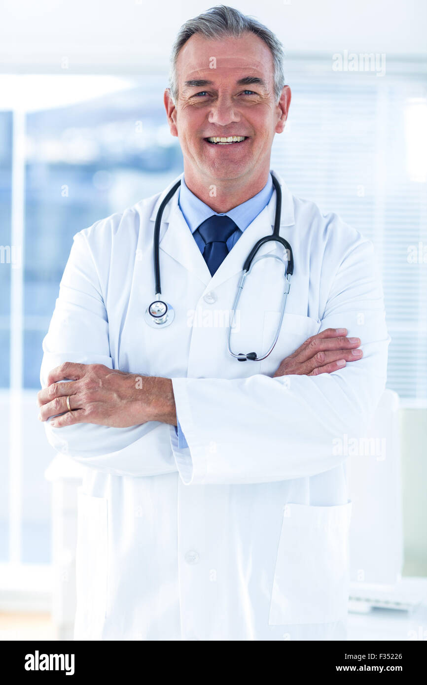 Male mature doctor smile hi-res stock photography and images - Alamy