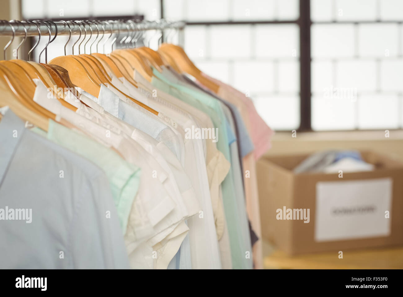 Clothes hanging on rack Stock Photo Alamy