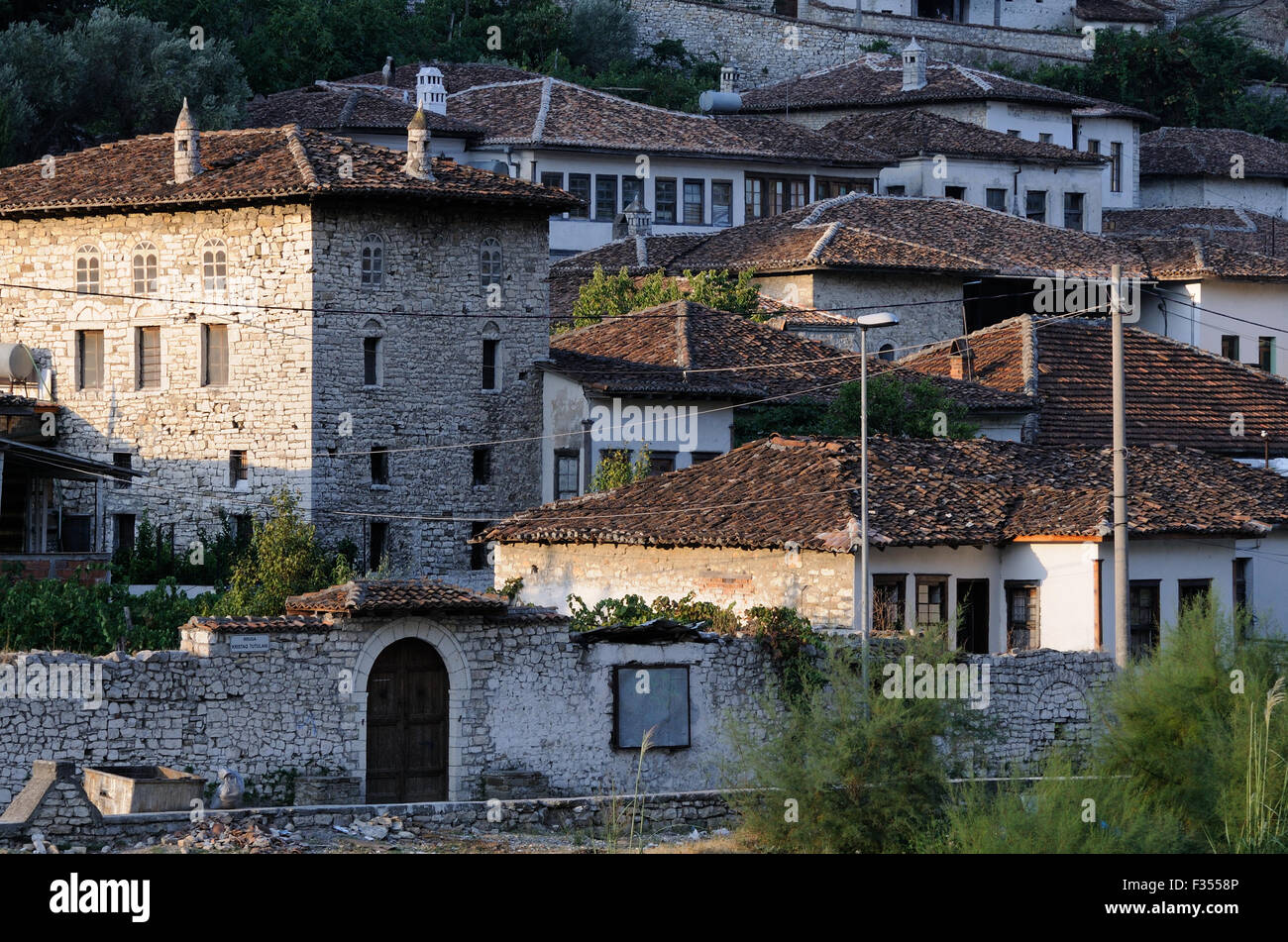 Stone houses with tiled roofs in the  world heritage site of  Mangalemi, The Ottoman quarter of Berat.  Berat, Albania. Stock Photo