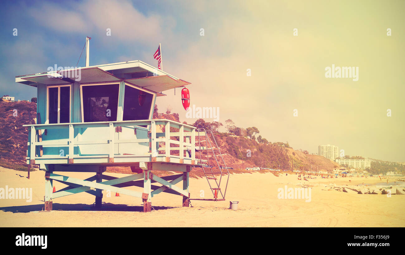 Retro stylized panoramic picture of a lifeguard tower in Santa Monica at sunset, California, USA. Stock Photo