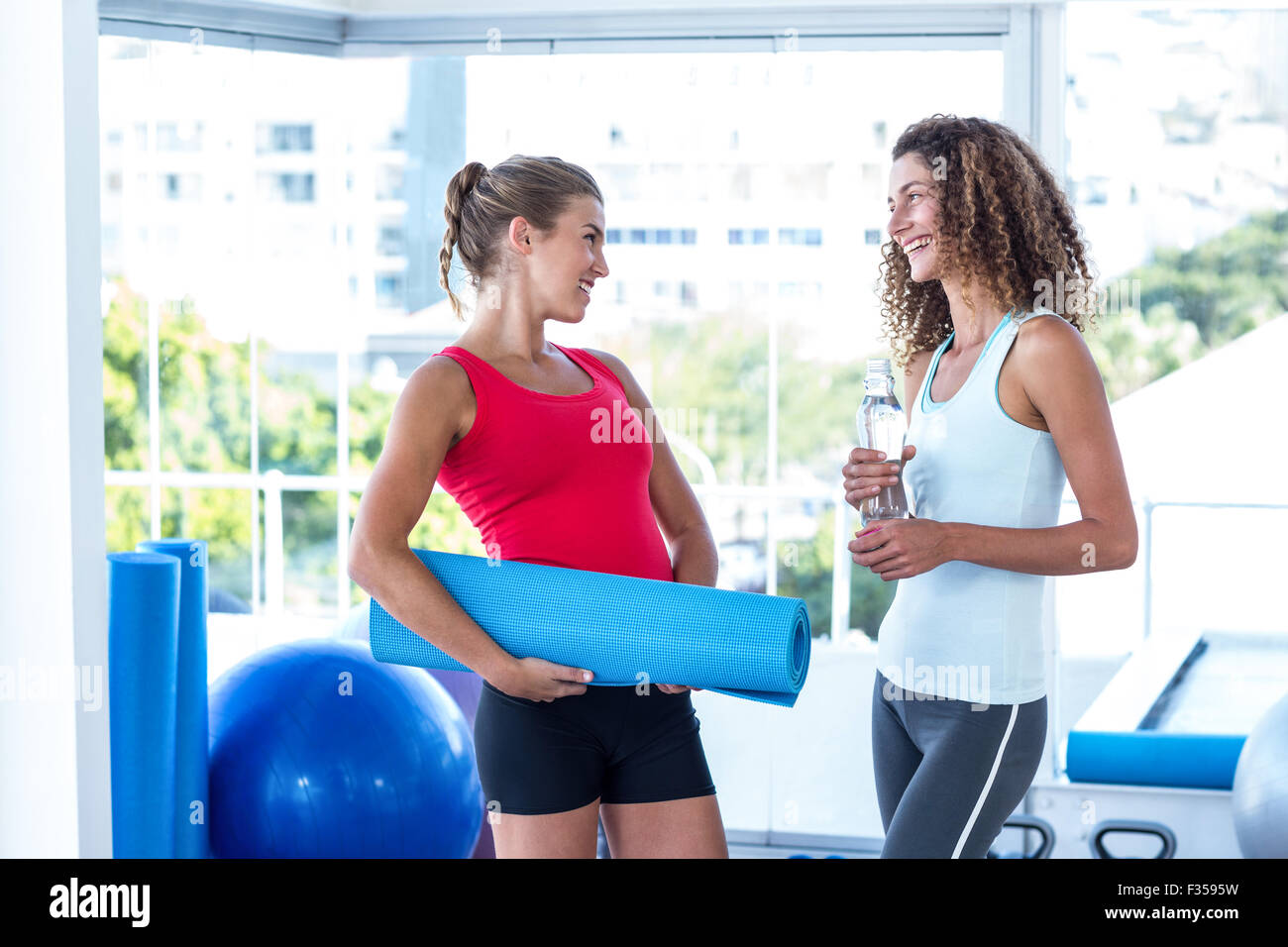 Women holding each other hi-res stock photography and images - Alamy