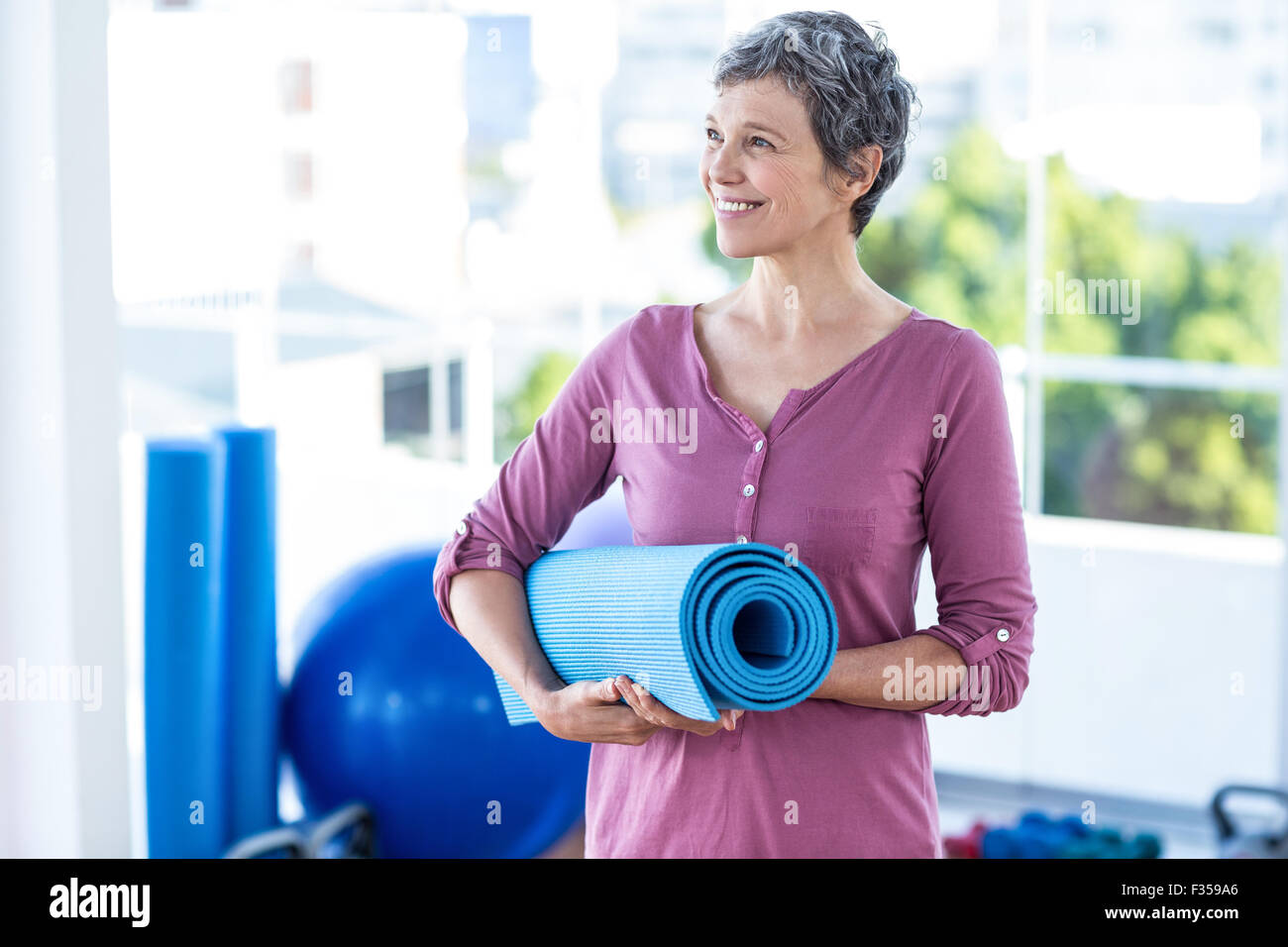 Mature woman thinking grey hair hi-res stock photography and images - Alamy