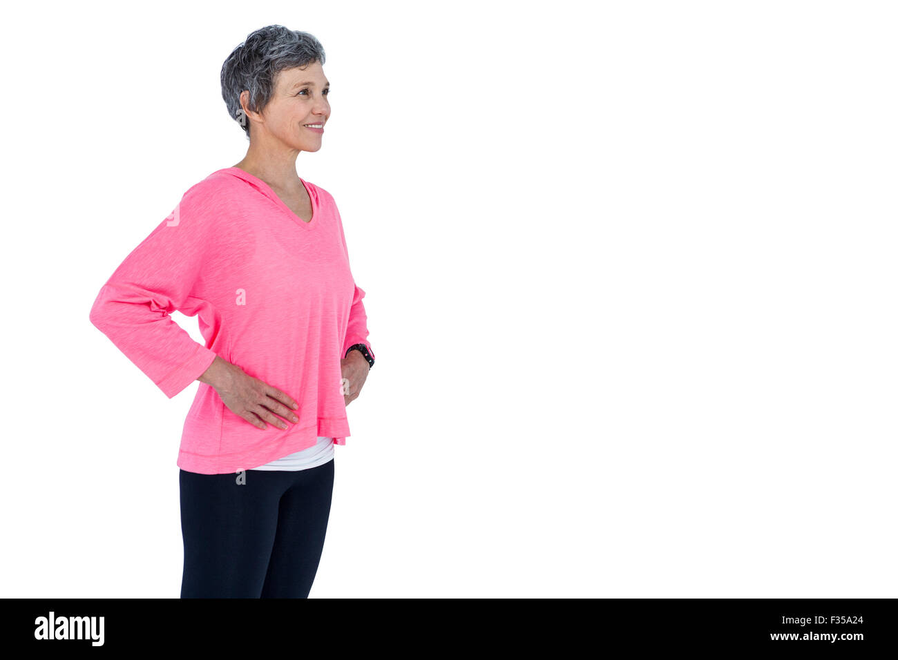 Mature woman with hand on hip Stock Photo