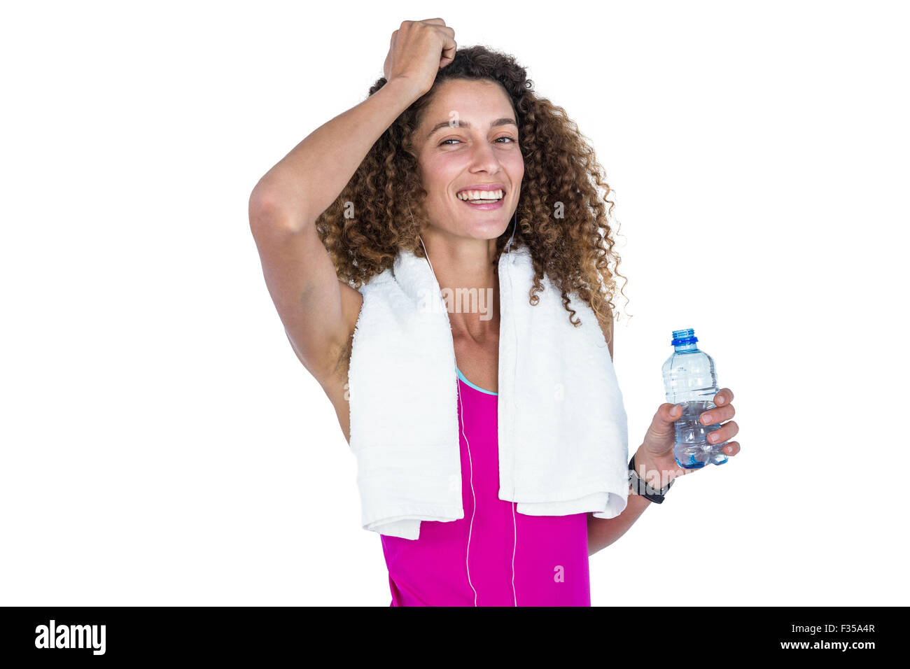 Portrait of happy young woman holding water bottle Stock Photo - Alamy