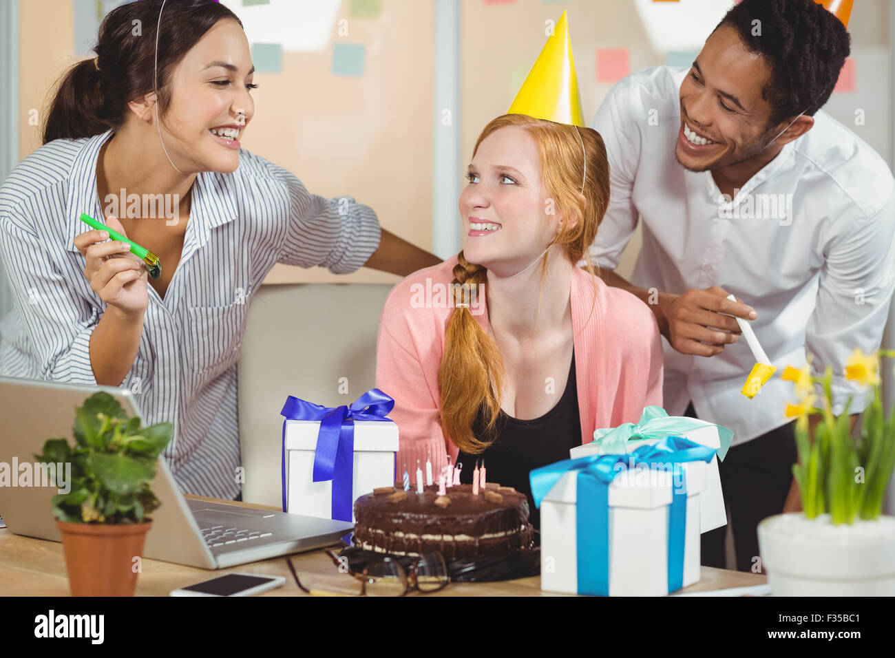 Colleagues celebrating birthday Stock Photo