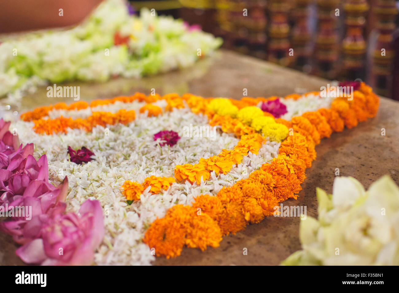 Floral offerings at the Temple of the Sacred Tooth Relic, Kandy,  Sri Lanka, Indian Ocean, Asia Stock Photo