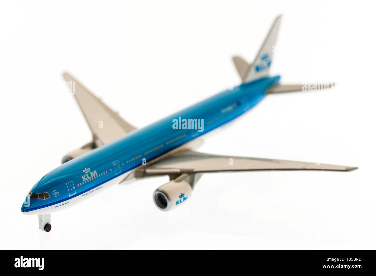 Die-cast metal 1/200th scale model of A320 airbus in the Dutch airline, KLM colours, blue and white. Plain white background with some underlighting. Stock Photo