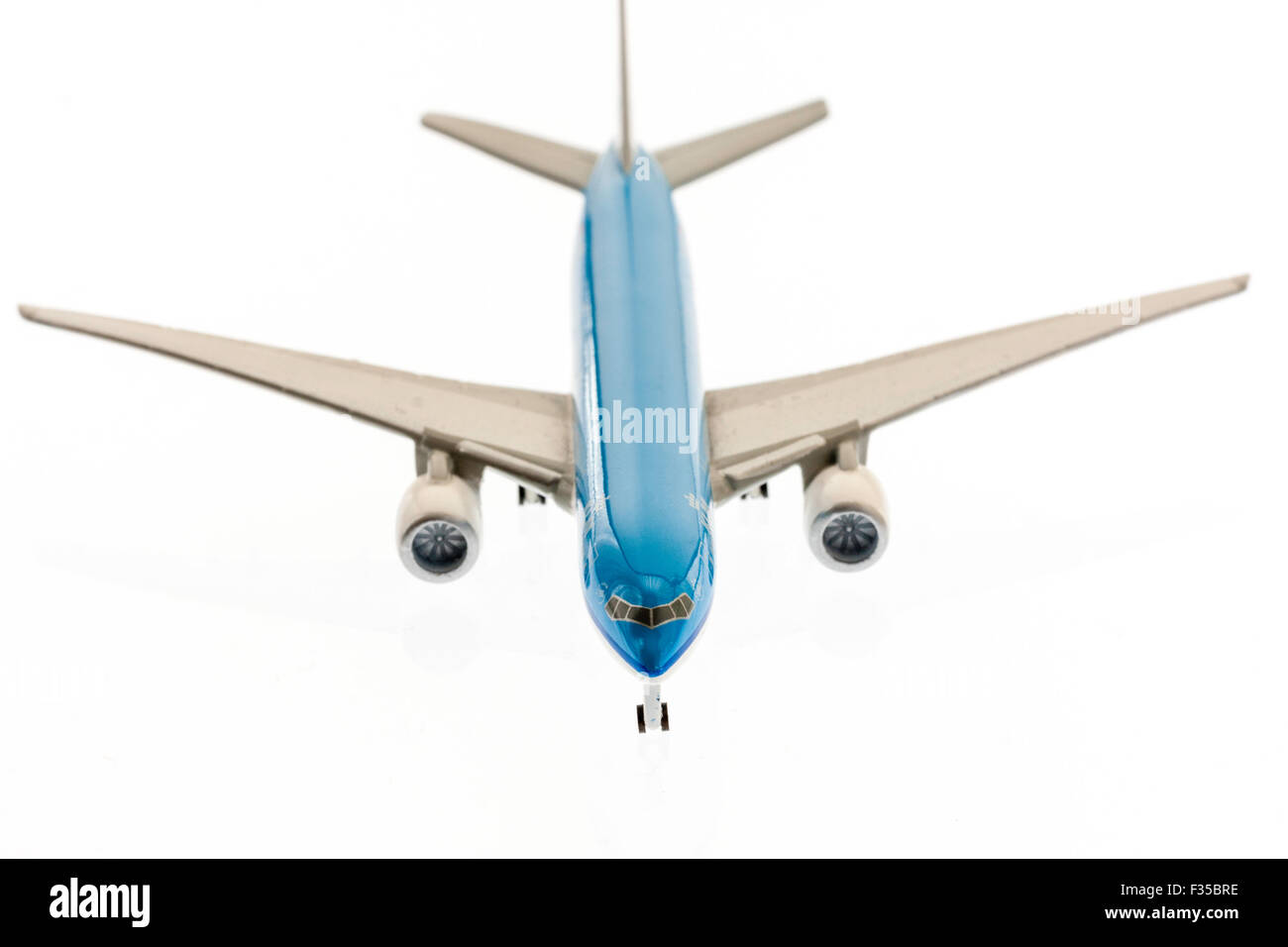 Die-cast metal 1/200th scale model of A320 airbus in the Dutch airline, KLM colours, blue and white. Plain white background with some underlighting. Stock Photo