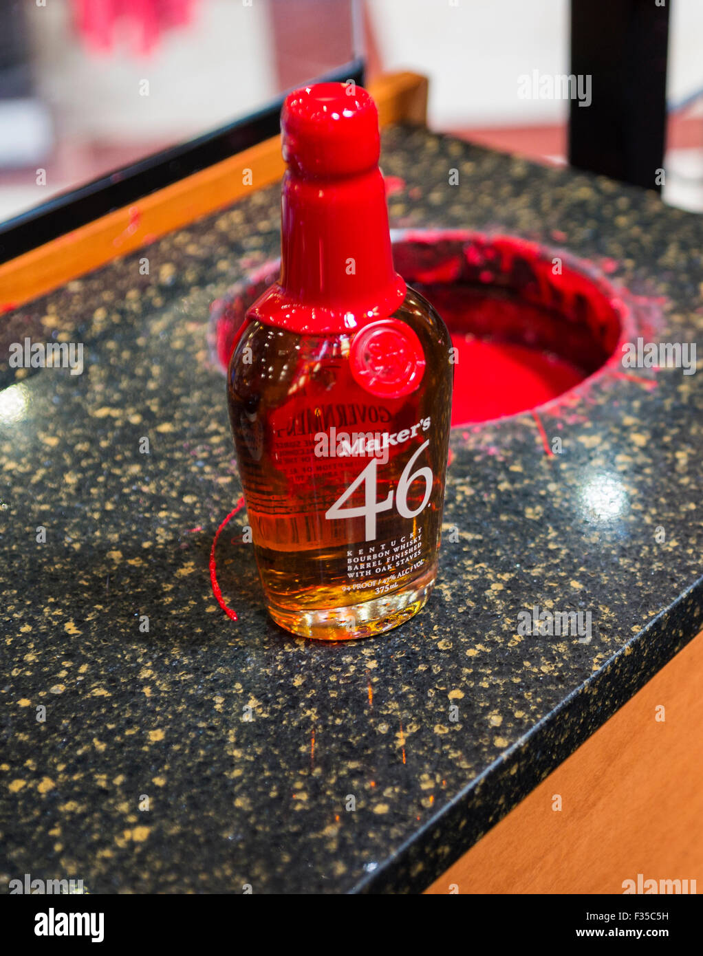 Bottle of Maker's 46 freshly dipped in red wax, Maker's Mark Bourbon distillery, Kentucky, USA Stock Photo