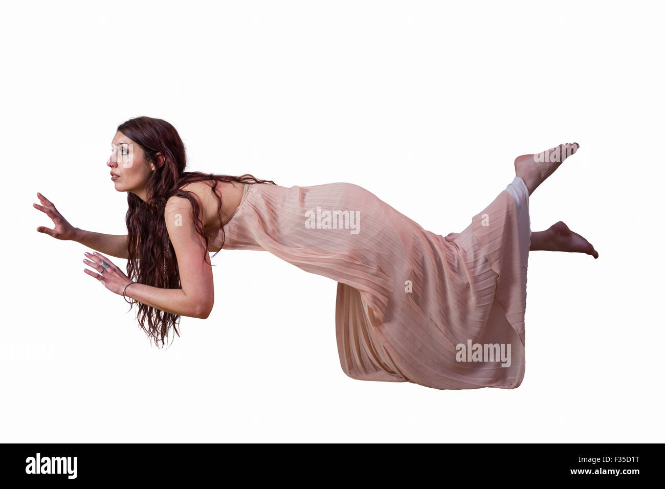 Full length of woman levitating Stock Photo
