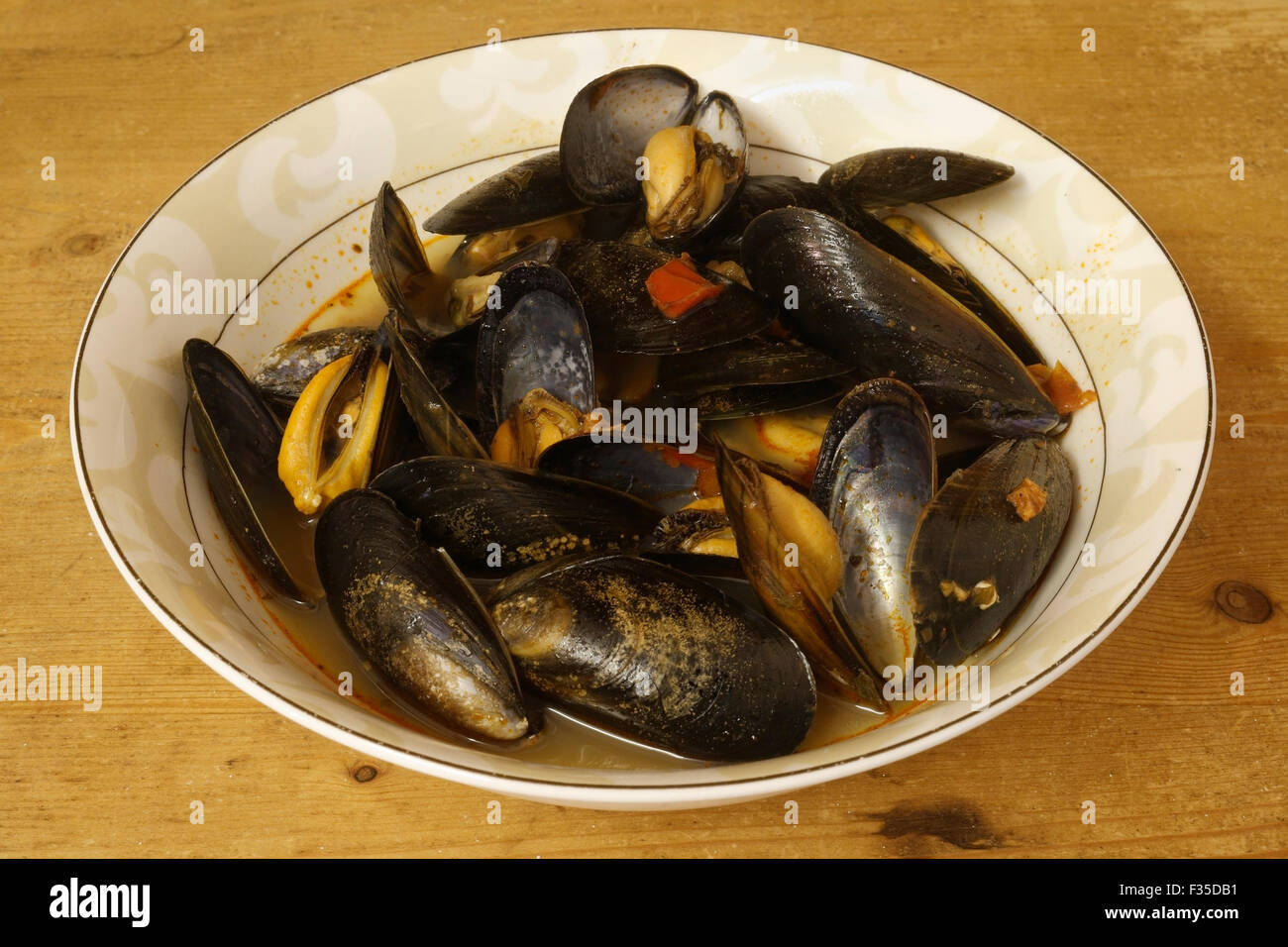 Dish of cooked Mussels in sauce, tasty food still life Stock Photo Alamy