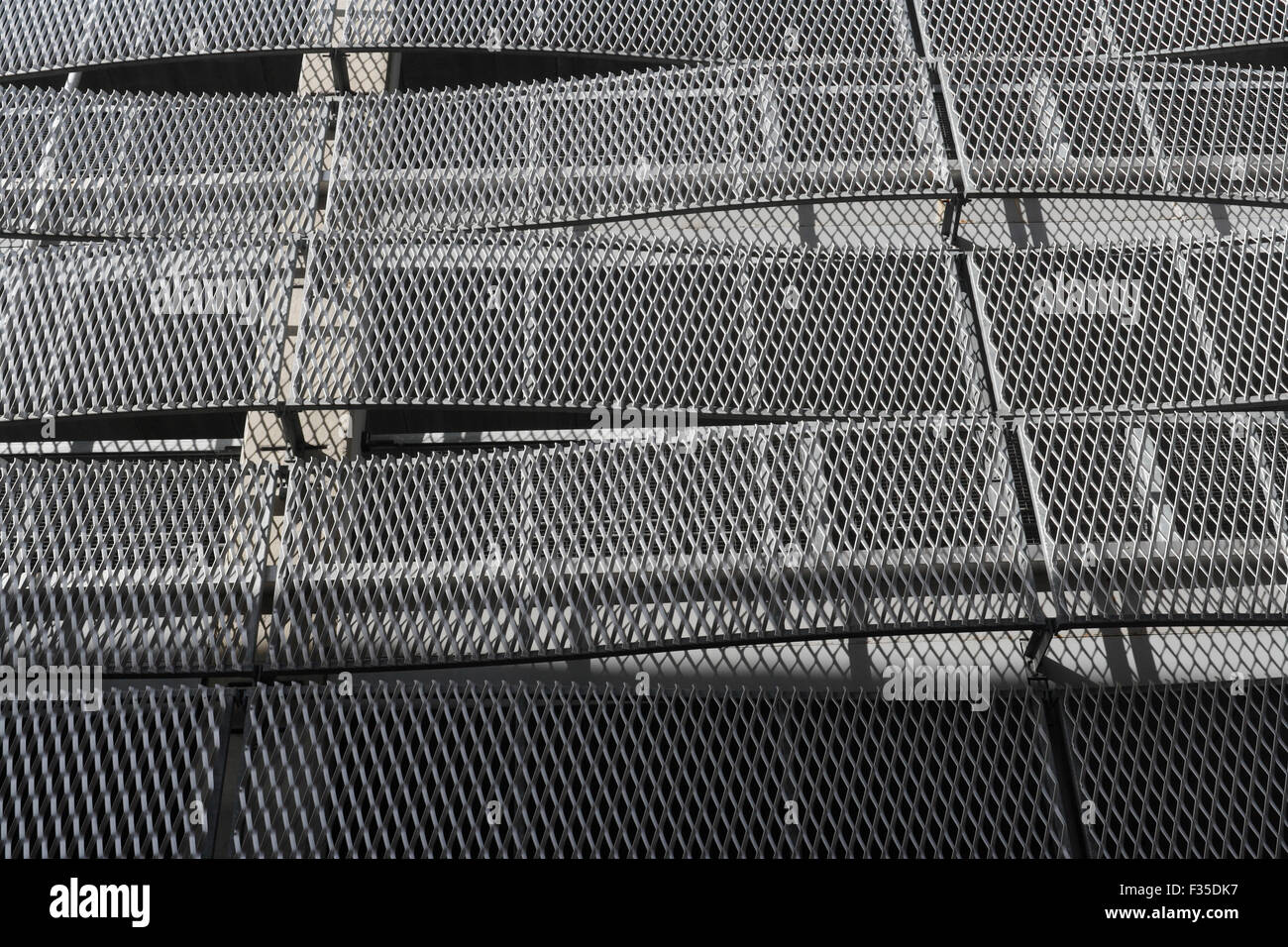 Exterior curved metal mesh on outside of car park building, Sheffield England Stock Photo