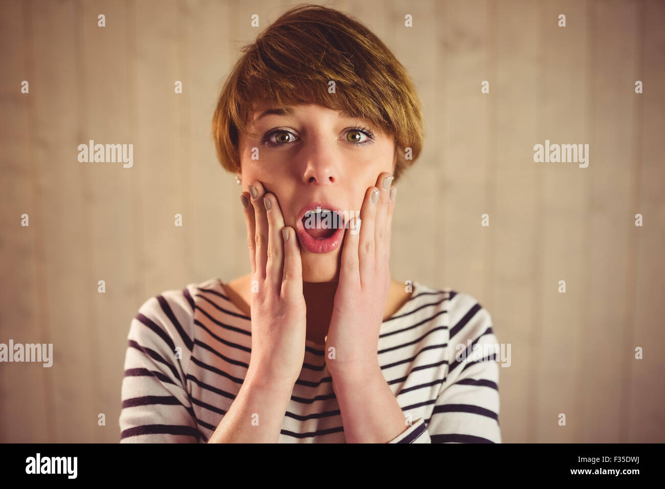 Attractive short hair woman surprised Stock Photo