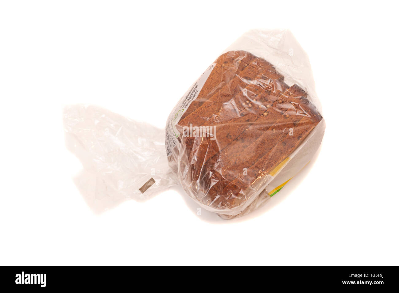 Bread in plastic bag isolated on white background Stock Photo Alamy