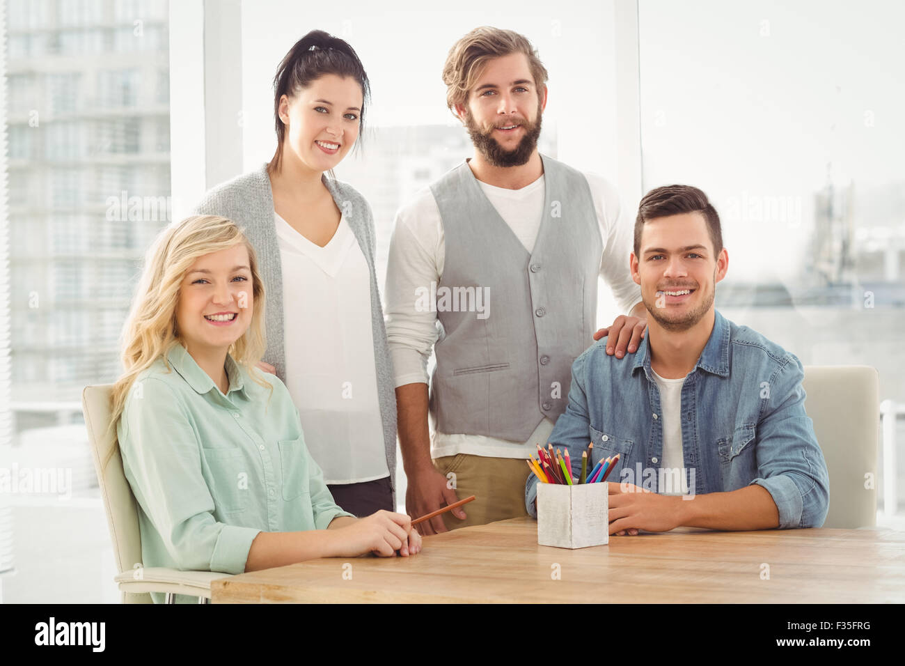 Portrait of smiling business people Stock Photo - Alamy