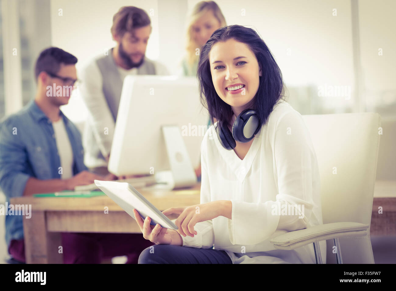 Portrait of smiling woman with headphones Stock Photo - Alamy