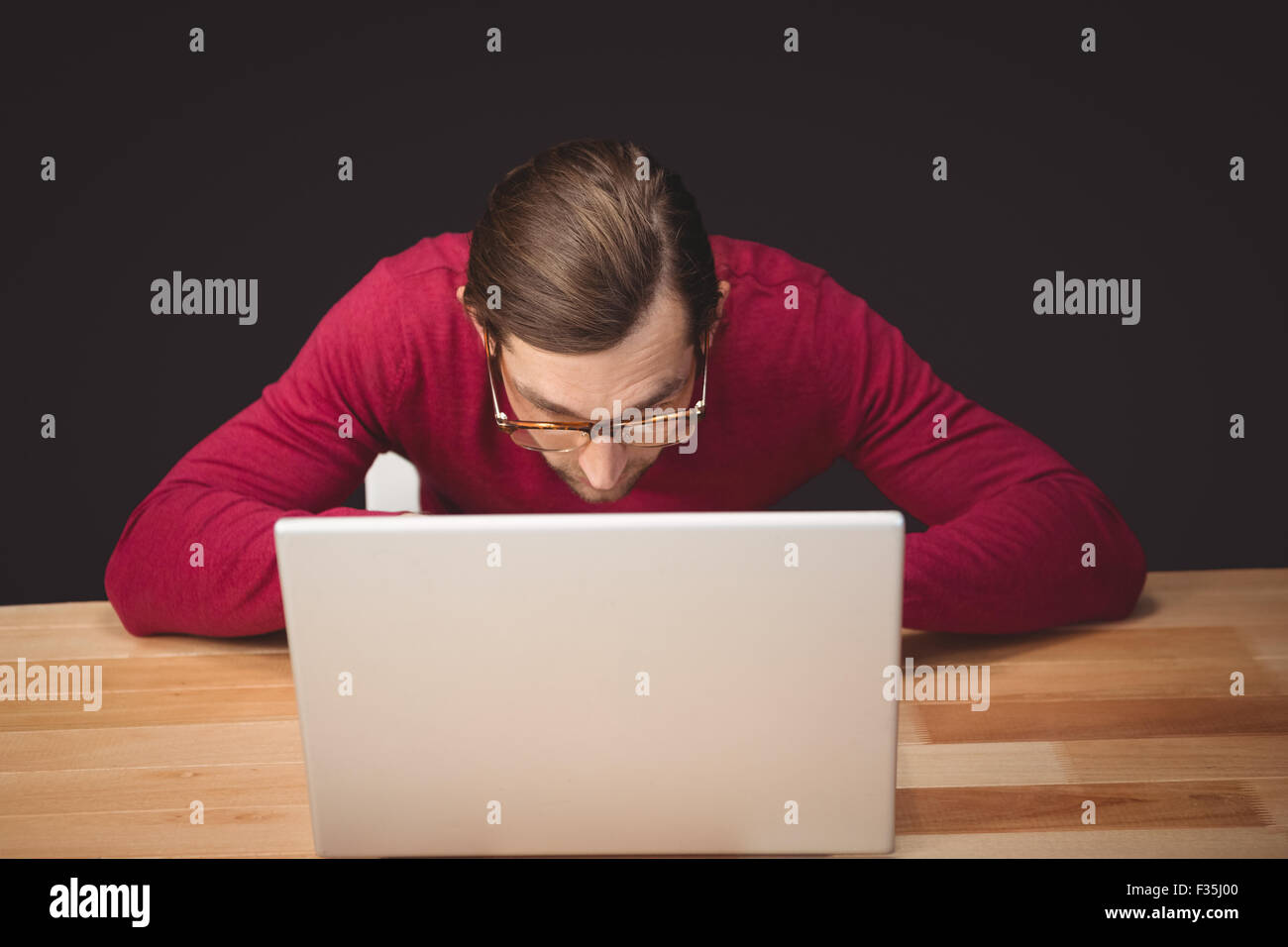Man working on laptop Stock Photo