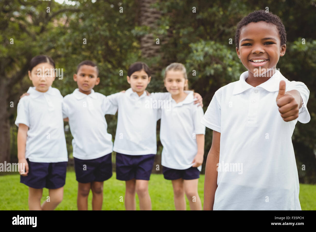 Students Standing Group of students standing together Stock Photo - Alamy