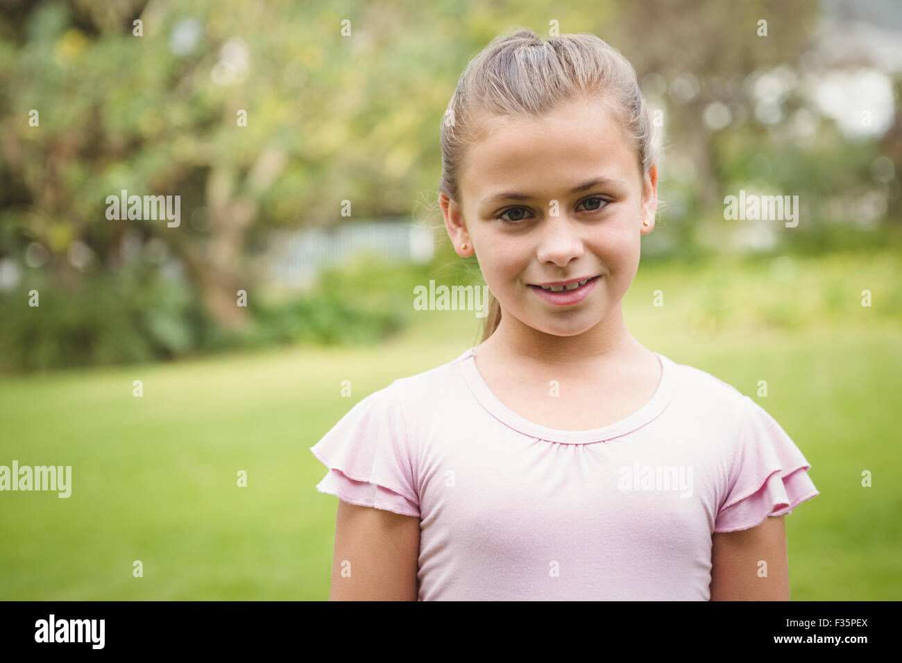 Smiling student looking at the camera Stock Photo - Alamy