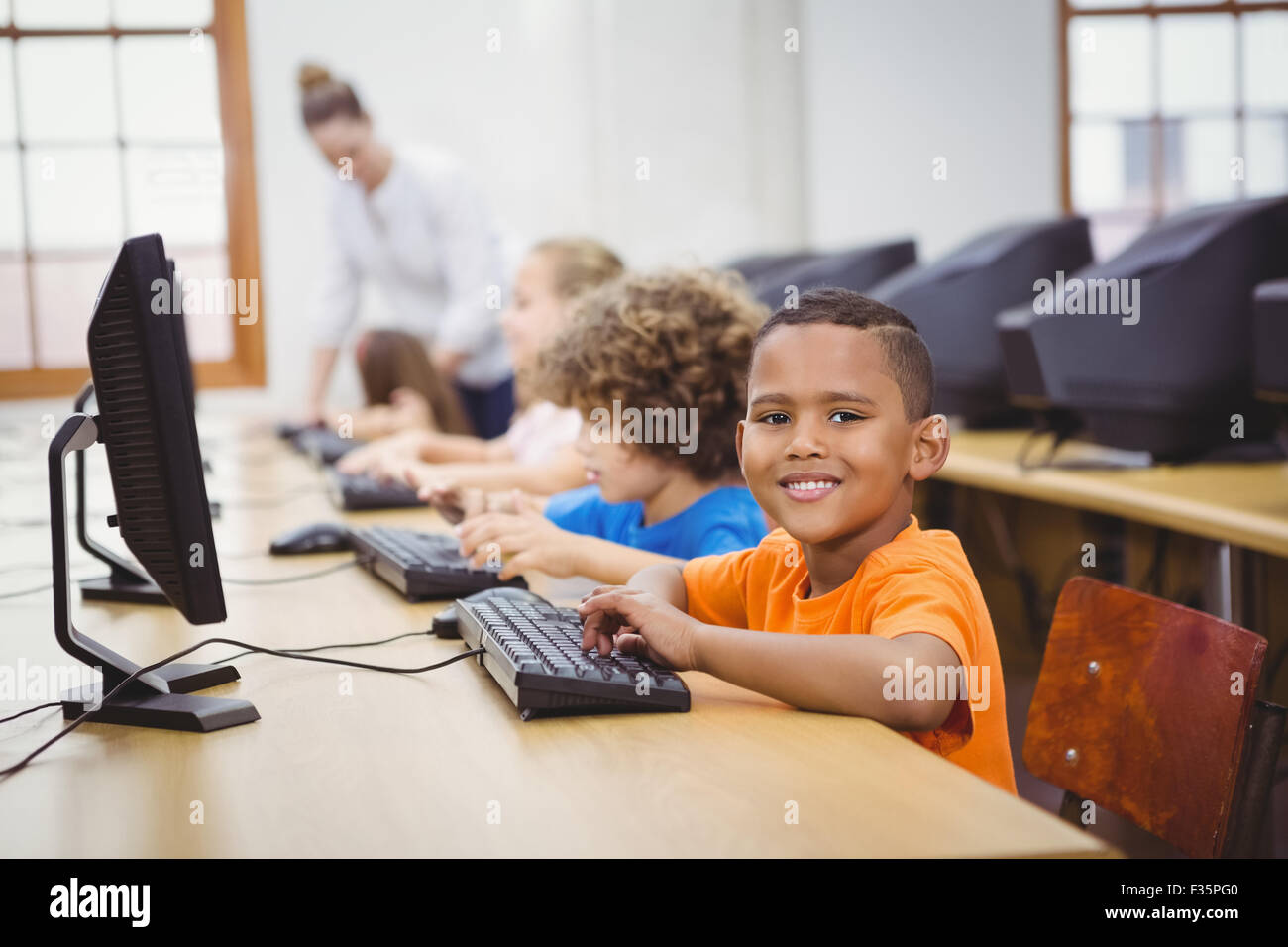 Computer Lessons Pictures Students using computers in the classroom Stock Photo - Alamy