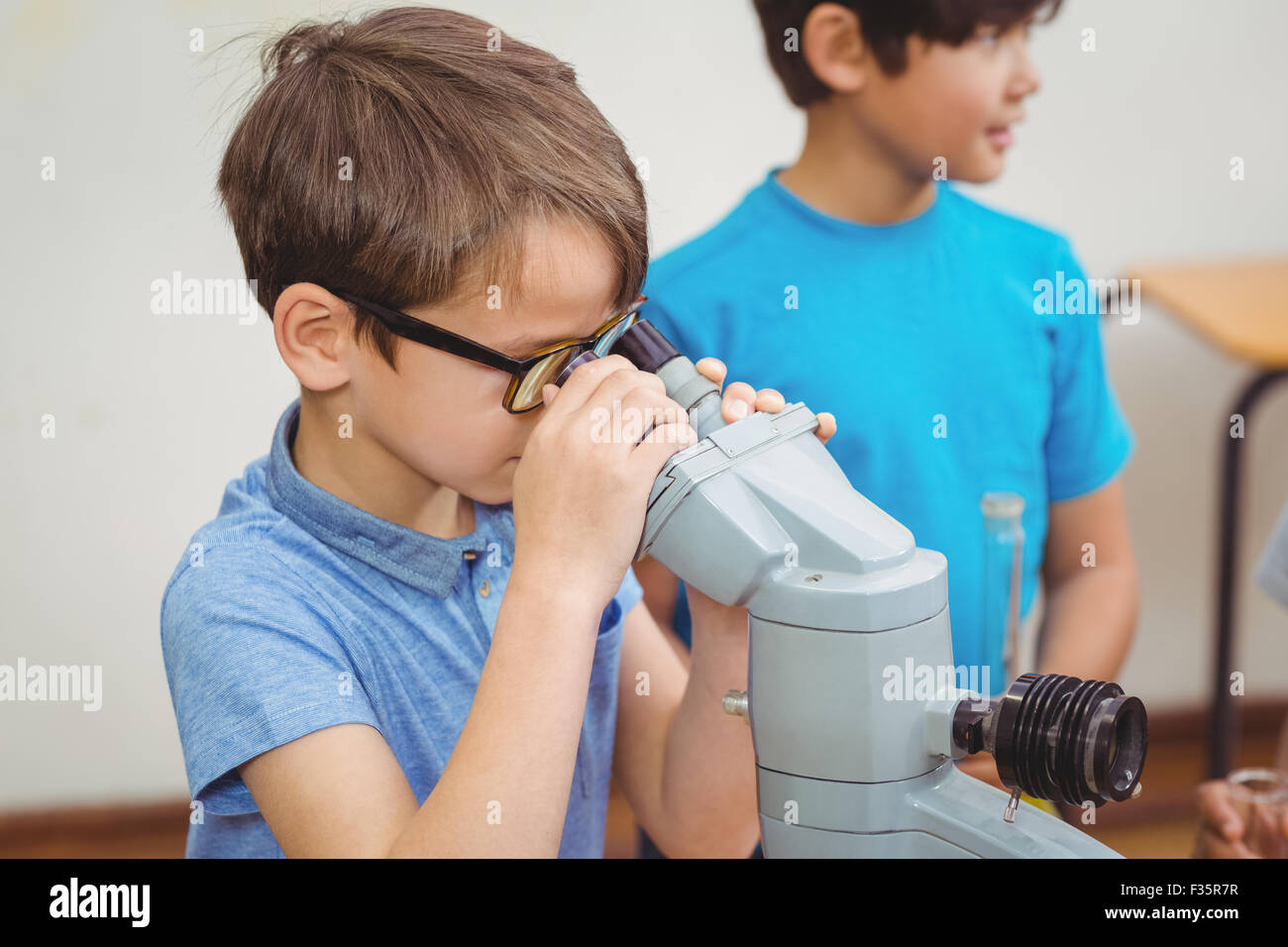 Pupils at science lesson in classroom Stock Photo - Alamy