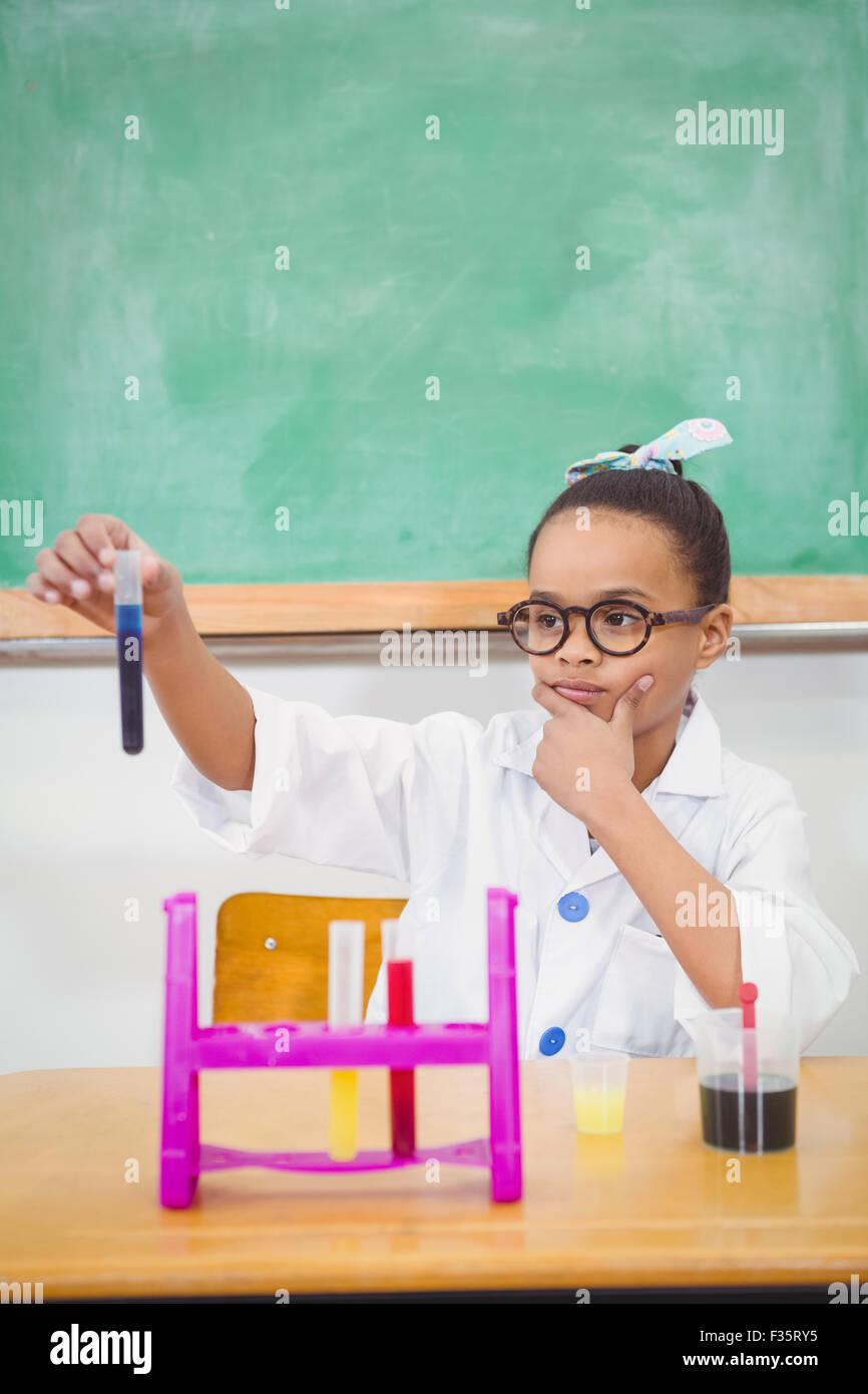 Student using a chemistry set Stock Photo