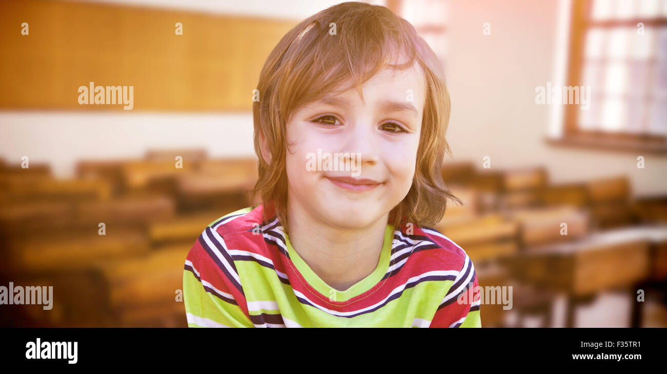 Composite image of happy little boy in the park Stock Photo - Alamy