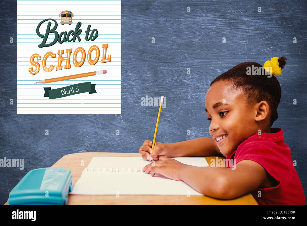 Composite image of pupil at her desk Stock Photo - Alamy