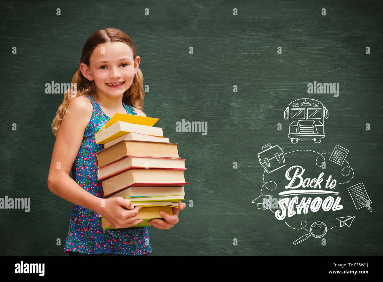 Composite image of cute little girl carrying books in library Stock ...