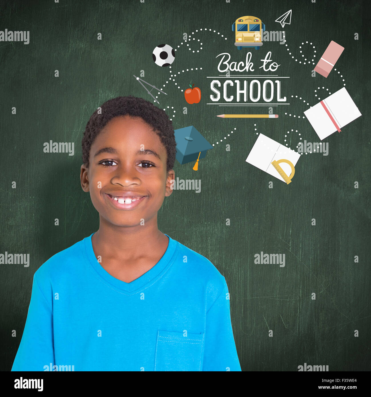 Composite image of cute boy smiling at camera Stock Photo - Alamy