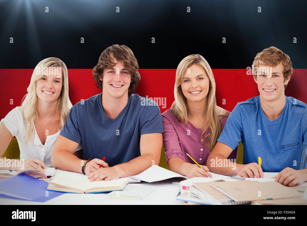 Composite image of four students looking at the camera Stock Photo - Alamy