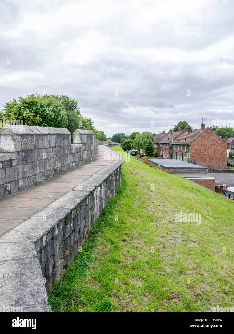 York city walls with houses in the background Stock Photo Alamy