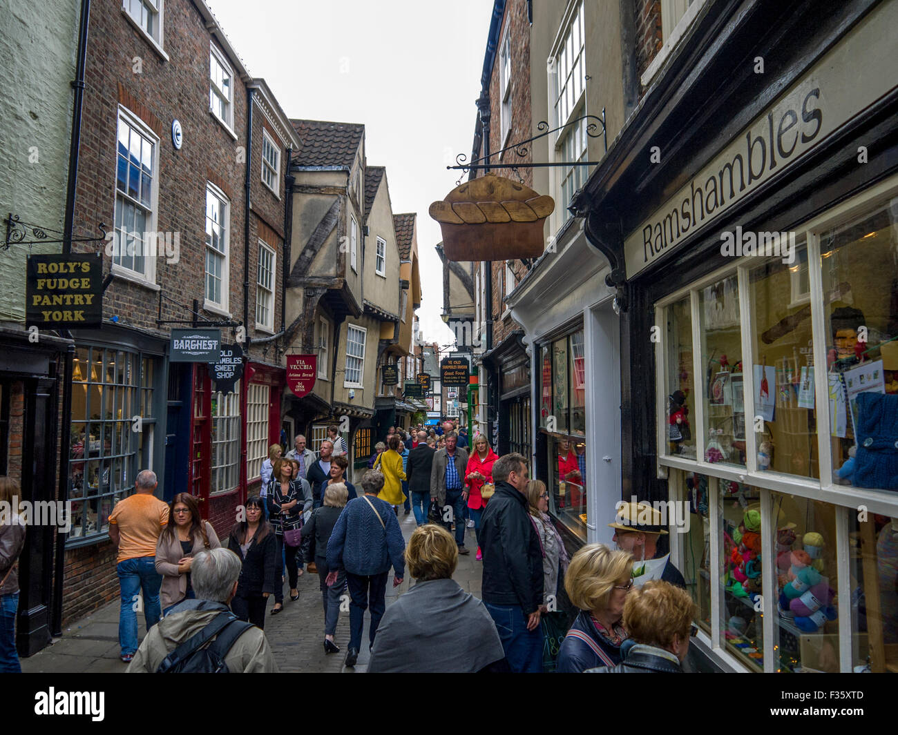 Old shopping street full of people in York Stock Photo