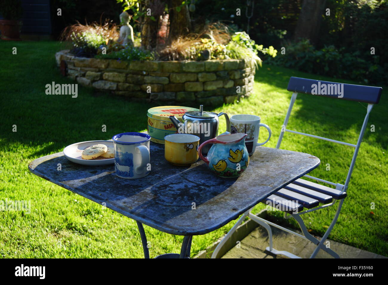 Afternoon garden tea French bistro table Stock Photo Alamy