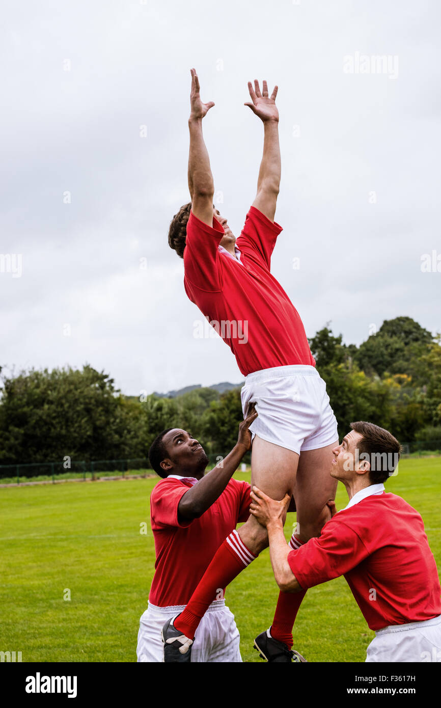 Rugby players jumping for line out Stock Photo Alamy