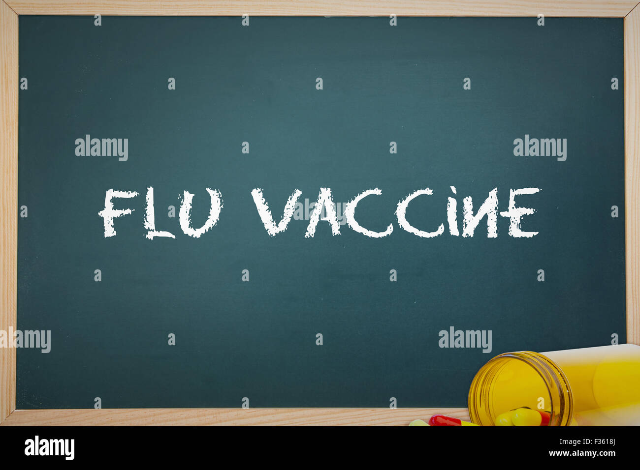 Flu vaccine against spilled pills Stock Photo