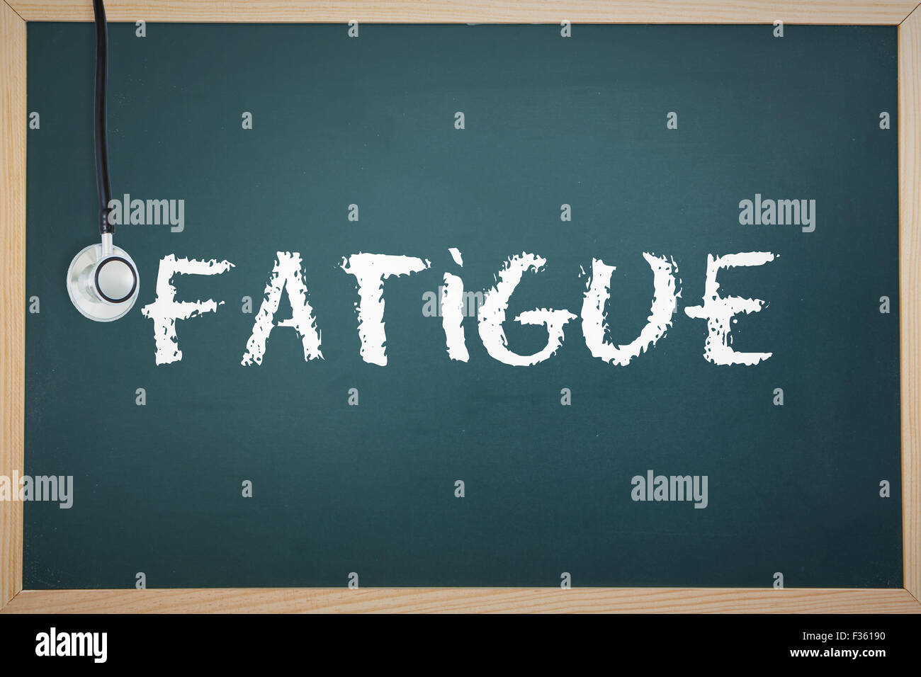 Fatigue against chalkboard Stock Photo
