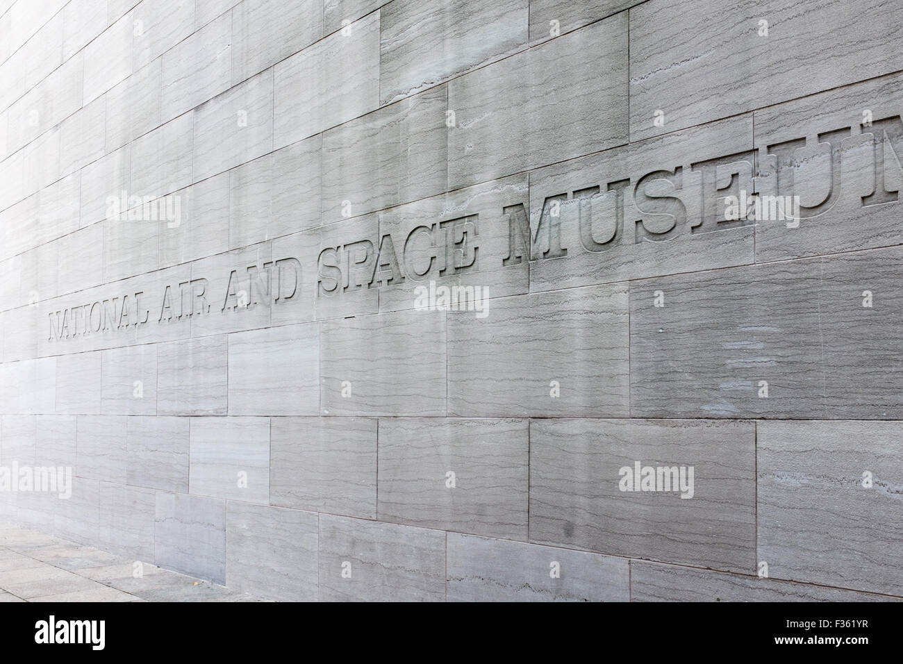 National Air and Space Museum sign etched on stone wall at the entrance Stock Photo