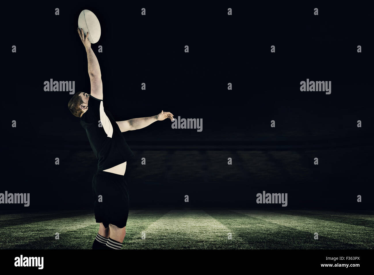 Focused black man catching soccer hi-res stock photography and images ...