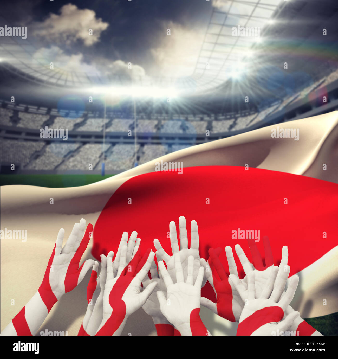 Composite image of people raising hands in the air Stock Photo - Alamy