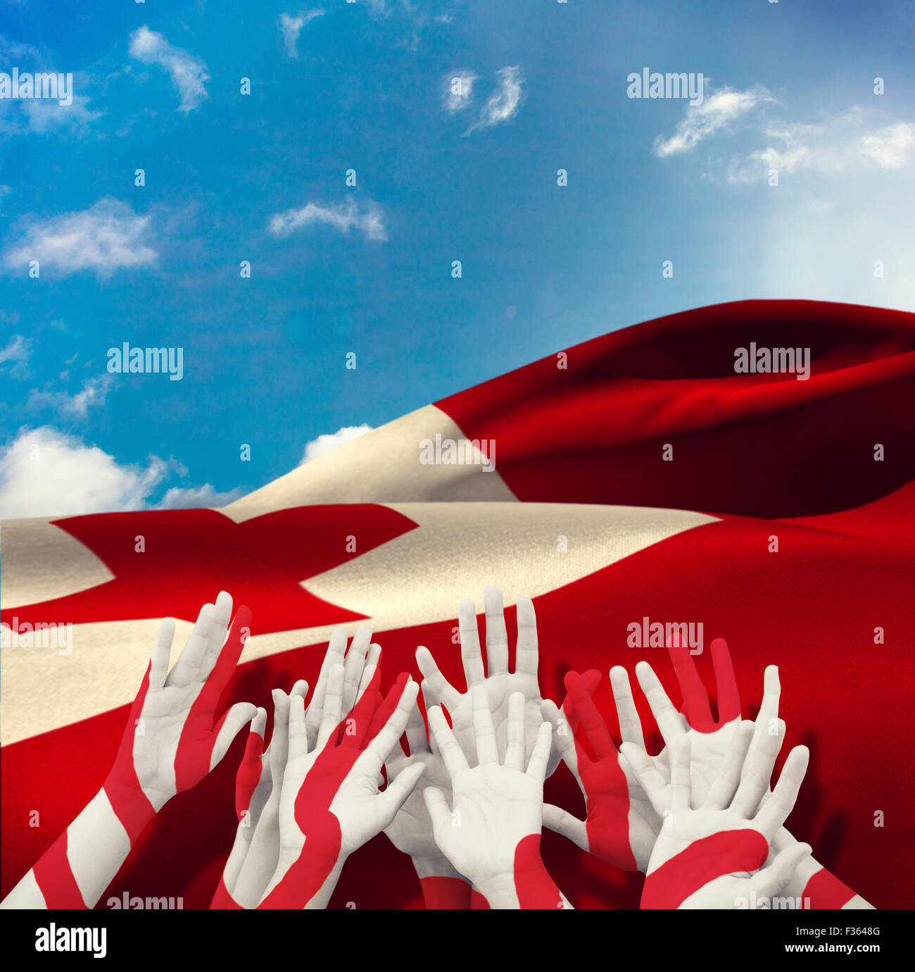 Composite image of people raising hands in the air Stock Photo - Alamy