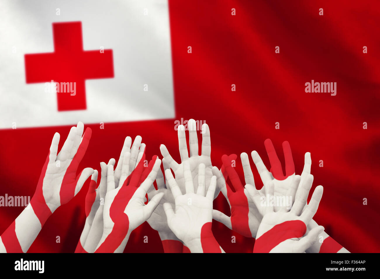 Composite image of people raising hands in the air Stock Photo - Alamy