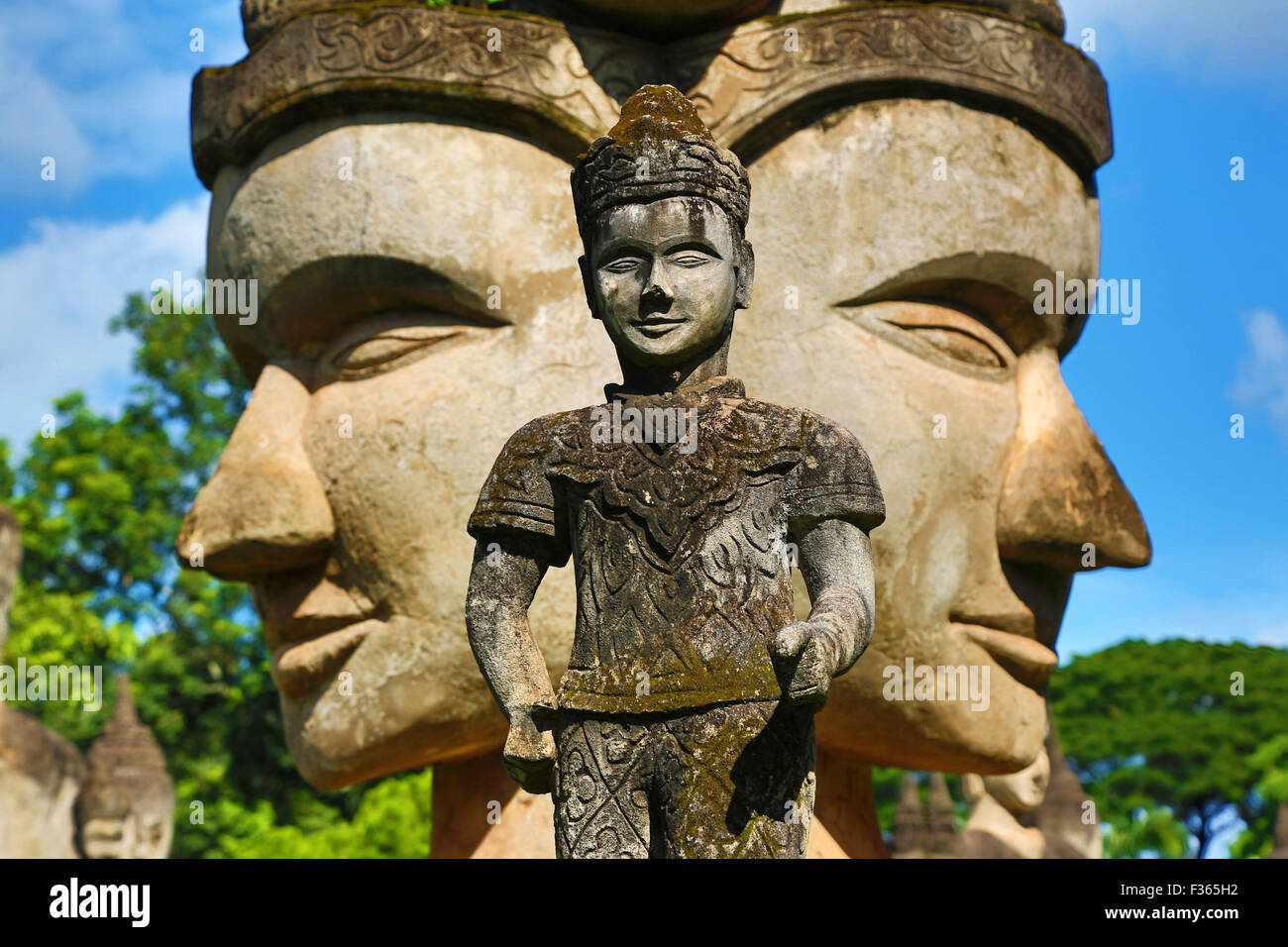 Statues of Buddha heads and faces at the Buddha Park, Vientiane, Laos Stock Photo