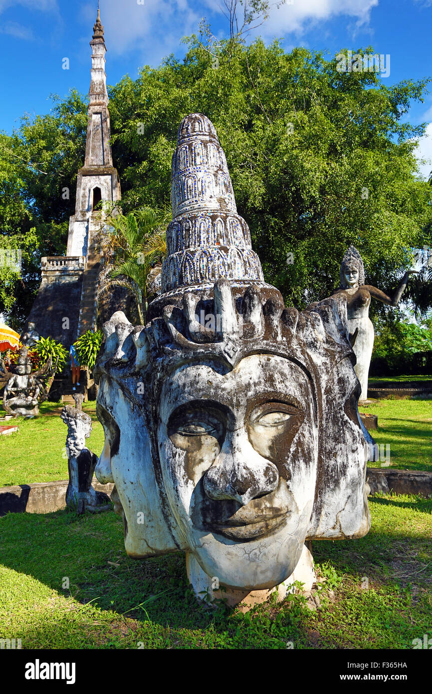 Statues of Buddha heads and faces at the Buddha Park, Vientiane, Laos Stock Photo